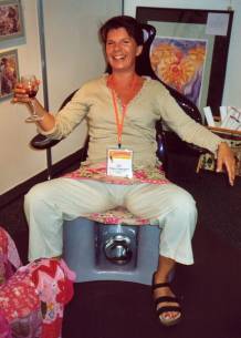 Photo of midwife with glass of wine on Seat