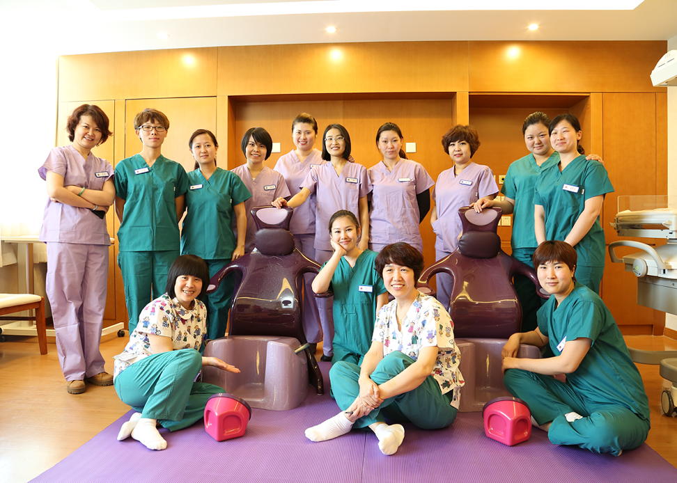 Image of midwives with BirthRite upright birthing equipment at New Century Women&rsquo;s and Children&rsquo;s Private Hospital, Beijing, China